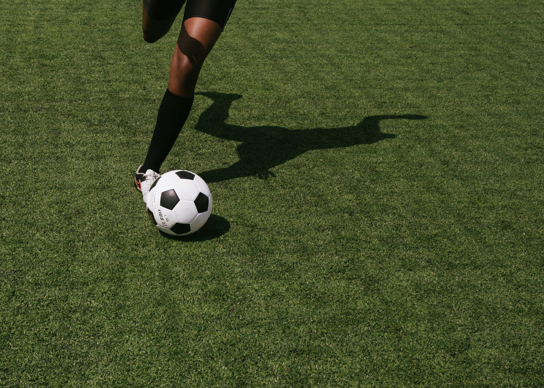 Anonymous soccer player on field during match